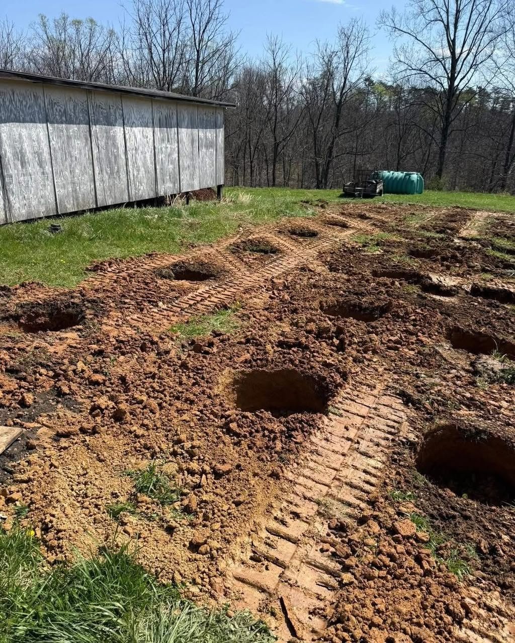 Grading and leveling a mobile home site pad